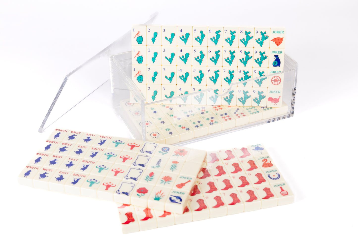 mahjong cowboy set on cream tiles. Set is beatifully stored in a clear acrylic box.