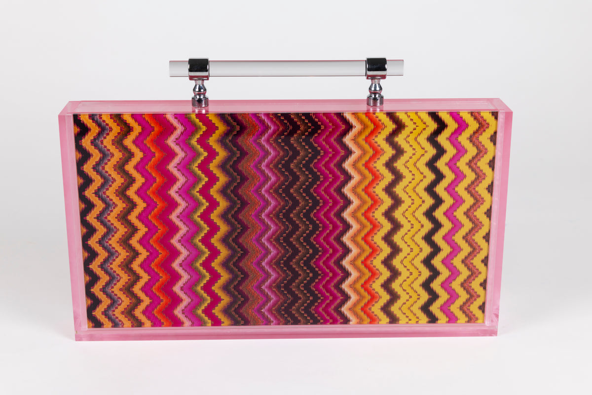 Missoni pink mini mahjong acrylic case with zig zag pattern with clear handle. 