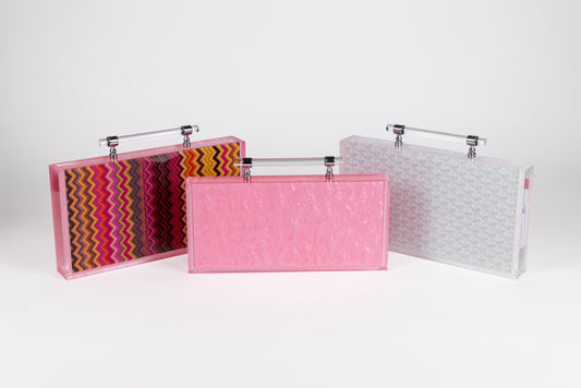 Set of 3 mini mahjong acrylic travel case and tile set. shown in marble pink, white pattern and chevron pink