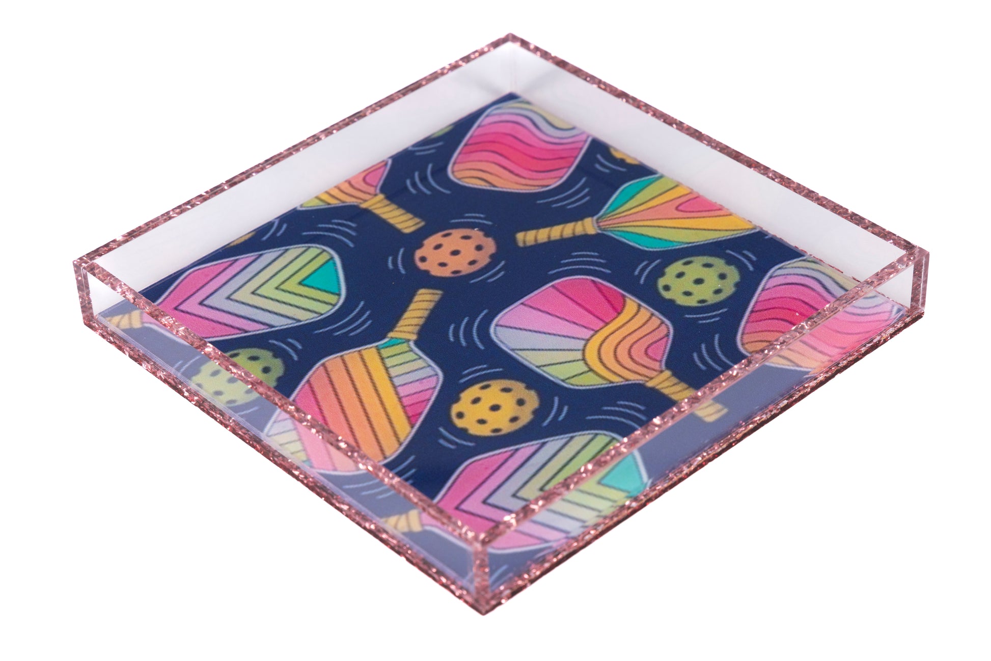 Decorative tray with colorful pickleball pattern on a blue background
