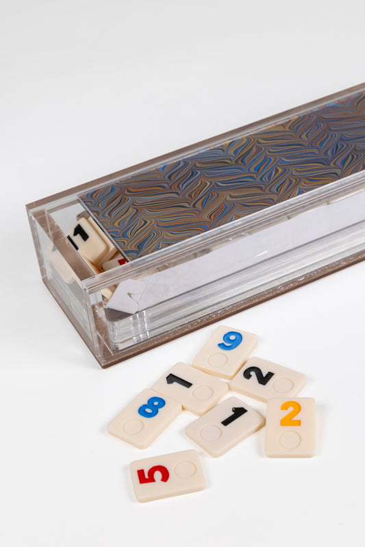 rummikub set in acrylic box with chevron pattern and tiles