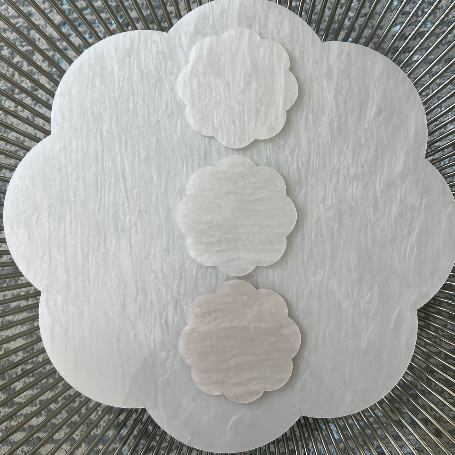 white scallop acrylic placemat with white coasters 