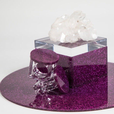 pink acrylic round placemat with glitter acrylic box and napkin rings