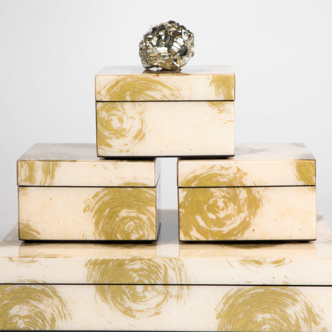 gold swirl lacquer box with pyrite stack